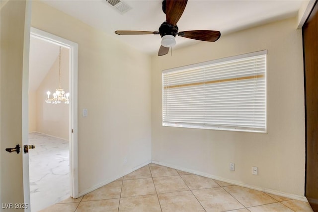 6822 Garden Grove Ave, Las Vegas, NV 89103 - spare room with a chandelier, ceiling fan, and light tile patterned floors