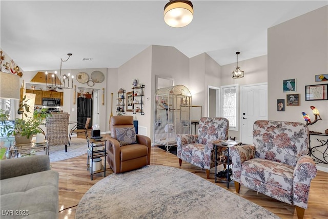 9237 Quail Ridge Dr, Las Vegas, NV 89134 - living room with wood finished floors and high vaulted ceiling