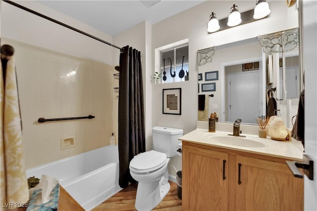 9237 Quail Ridge Dr, Las Vegas, NV 89134 - bathroom with vanity, wood finished floors, and shower / bath combination with curtain