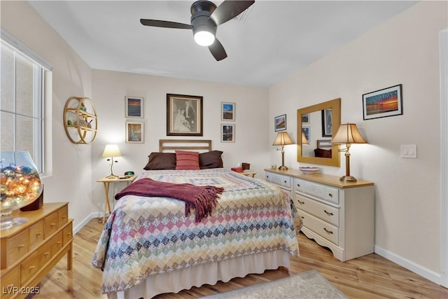 9237 Quail Ridge Dr, Las Vegas, NV 89134 - bedroom with light wood-style floors and a ceiling fan