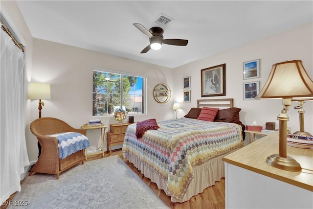 9237 Quail Ridge Dr, Las Vegas, NV 89134 - bedroom with light wood-type flooring and a ceiling fan