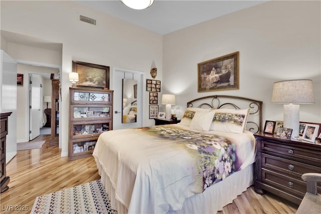 9237 Quail Ridge Dr, Las Vegas, NV 89134 - bedroom with light wood-type flooring and a closet