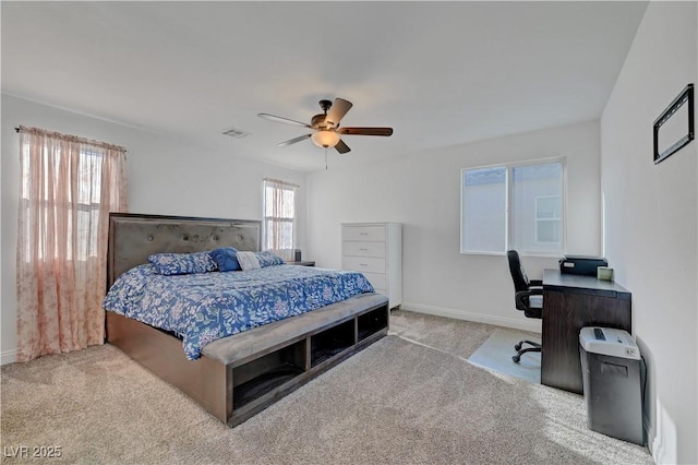 4641 Therapeutic St, North Las Vegas, NV 89031 - carpeted bedroom with a ceiling fan and a desk