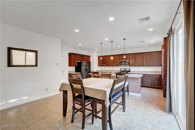 4641 Therapeutic St, North Las Vegas, NV 89031 - dining area with plenty of natural light and recessed lighting