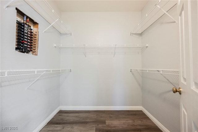 6006 Vegas Dr, Las Vegas, NV 89108 - walk in closet featuring wood finished floors