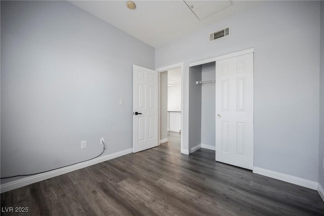 6006 Vegas Dr, Las Vegas, NV 89108 - unfurnished bedroom featuring dark wood-type flooring and a closet