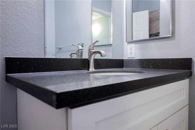 6006 Vegas Dr, Las Vegas, NV 89108 - bathroom featuring vanity and a textured wall