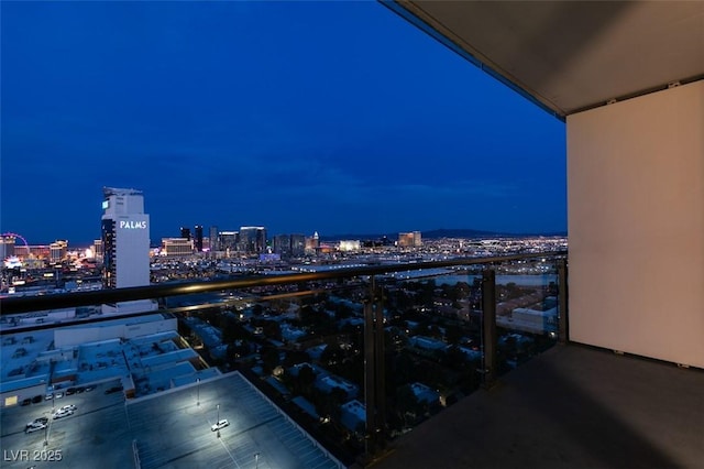 4381 Flamingo Rd Unit 2010, Las Vegas, NV 89103 - balcony at twilight with a view of city lights