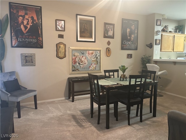 2050 N Los Feliz St Unit 170, Las Vegas, NV 89156 - dining area with light carpet and baseboards