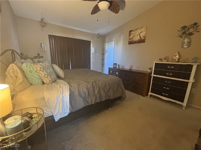 2050 N Los Feliz St Unit 170, Las Vegas, NV 89156 - bedroom featuring carpet, vaulted ceiling, and a ceiling fan
