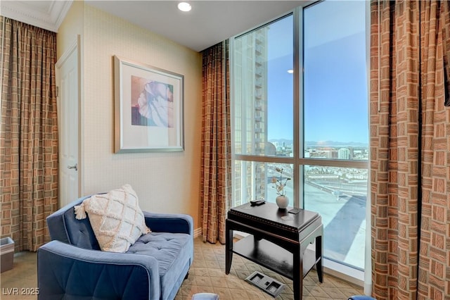 135 E Harmon Ave Unit 2721, Las Vegas, NV 89109 - sitting room featuring ornamental molding and recessed lighting