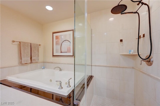 135 E Harmon Ave Unit 2721, Las Vegas, NV 89109 - full bathroom with a stall shower and a whirlpool tub