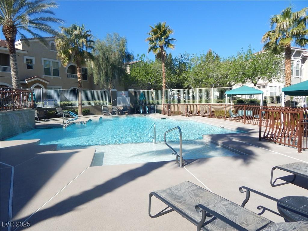 9975 Peace Way Unit 1149, Las Vegas, NV 89147 - community pool with a patio