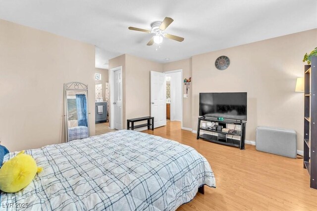 6068 Conroe Ct, Las Vegas, NV 89118 - bedroom with light wood finished floors and a ceiling fan