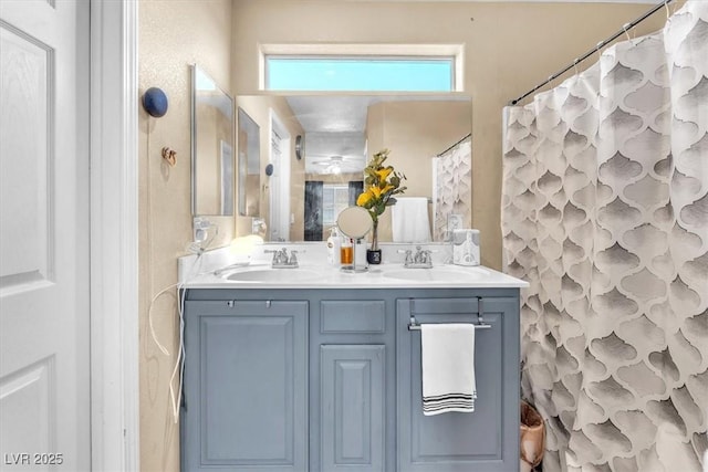 6068 Conroe Ct, Las Vegas, NV 89118 - full bath with double vanity and healthy amount of natural light