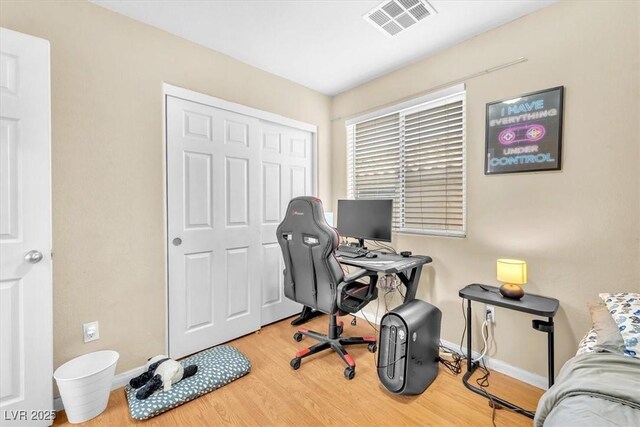 6068 Conroe Ct, Las Vegas, NV 89118 - office with wood finished floors and baseboards
