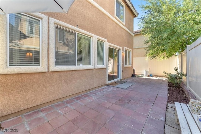 6068 Conroe Ct, Las Vegas, NV 89118 - fenced backyard featuring a patio