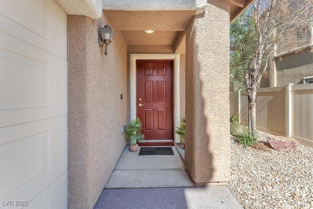 6068 Conroe Ct, Las Vegas, NV 89118 - doorway to property featuring stucco siding