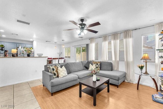 6068 Conroe Ct, Las Vegas, NV 89118 - living room with ceiling fan, light tile patterned floors, and recessed lighting