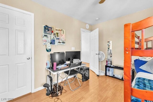 6068 Conroe Ct, Las Vegas, NV 89118 - home office featuring wood finished floors and a ceiling fan