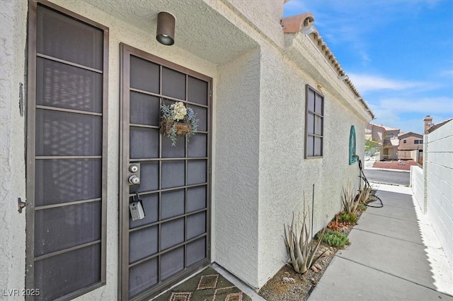 9151 Indian Breeze Dr, Las Vegas, NV 89129 - entrance to property with stucco siding