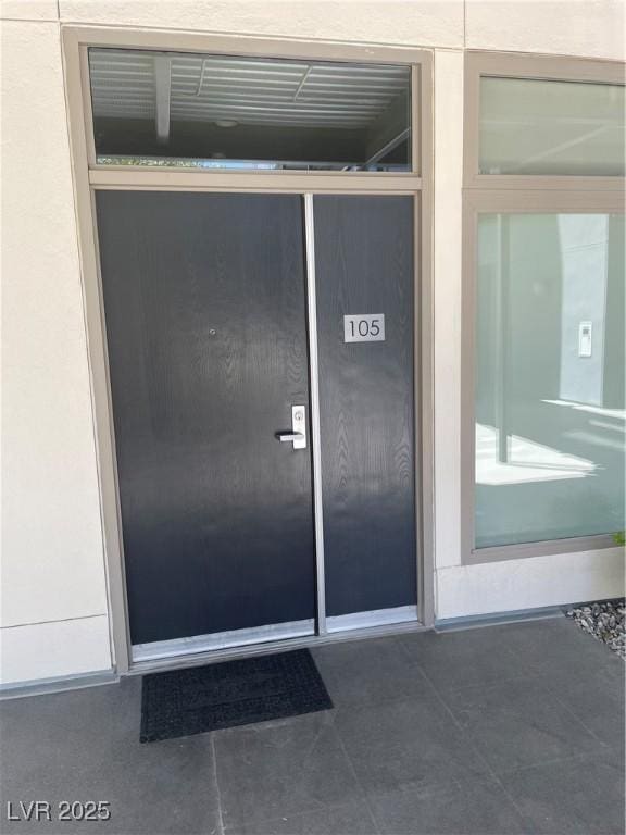 8925 W Flamingo Rd Unit 105, Las Vegas, NV 89147 - property entrance featuring stucco siding