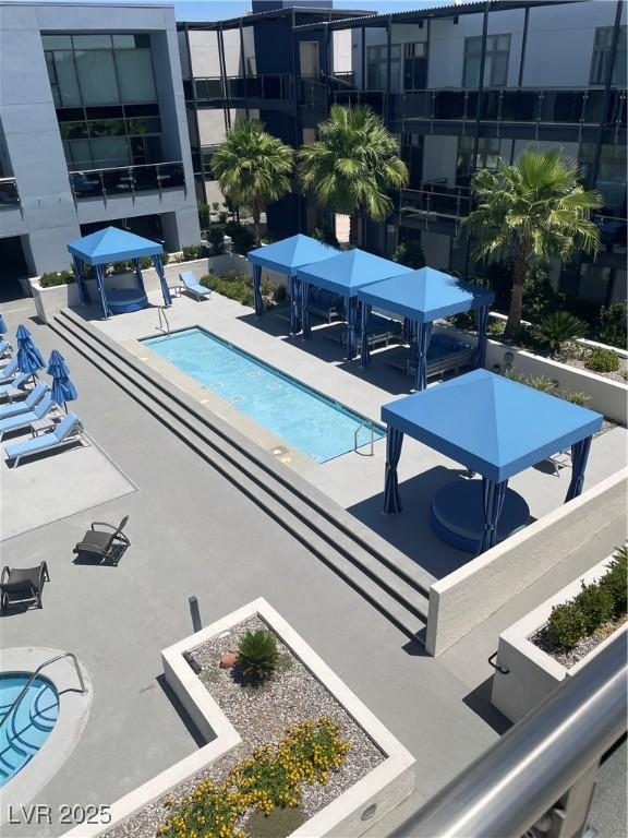 8925 W Flamingo Rd Unit 105, Las Vegas, NV 89147 - community pool with a gazebo and a patio