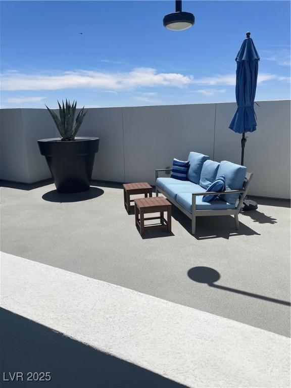 8925 W Flamingo Rd Unit 105, Las Vegas, NV 89147 - view of patio / terrace with outdoor lounge area