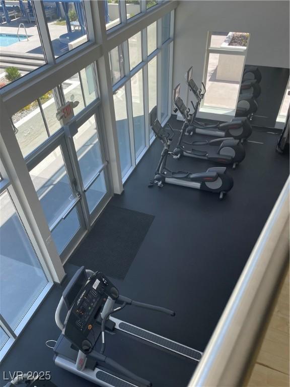 8925 W Flamingo Rd Unit 105, Las Vegas, NV 89147 - exercise room with french doors
