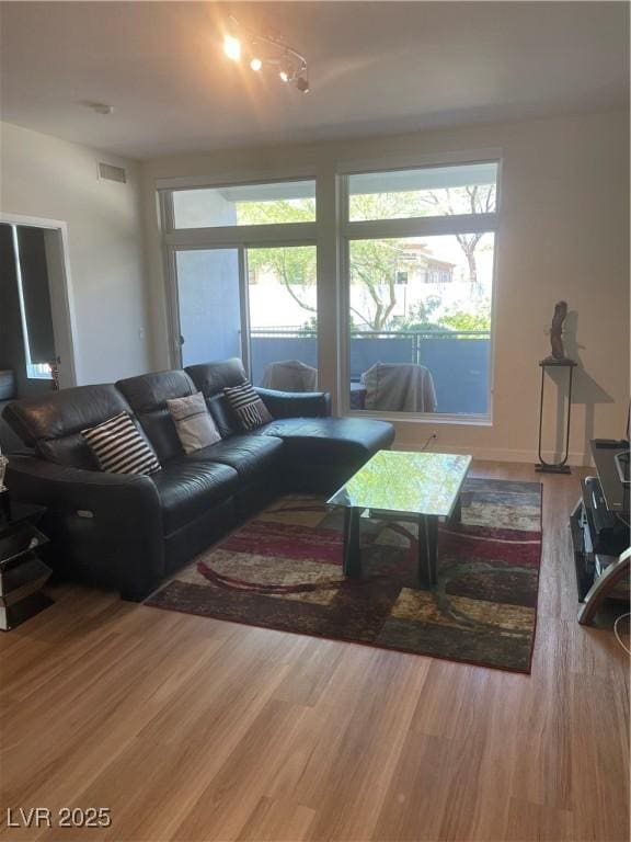 8925 W Flamingo Rd Unit 105, Las Vegas, NV 89147 - living room with wood finished floors