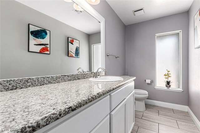 3158 Brockington Dr, Las Vegas, NV 89120 - bathroom featuring toilet and vanity