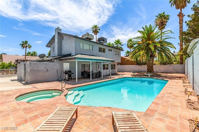 3158 Brockington Dr, Las Vegas, NV 89120 - view of pool featuring a fenced backyard, a patio, a grill, and a pool with connected hot tub