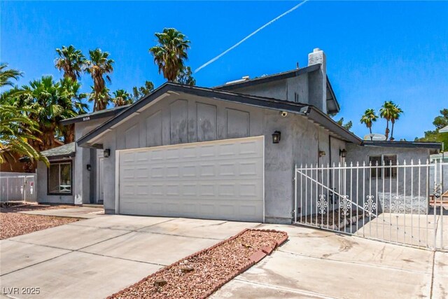 3158 Brockington Dr, Las Vegas, NV 89120 - view of front of house with a garage and driveway