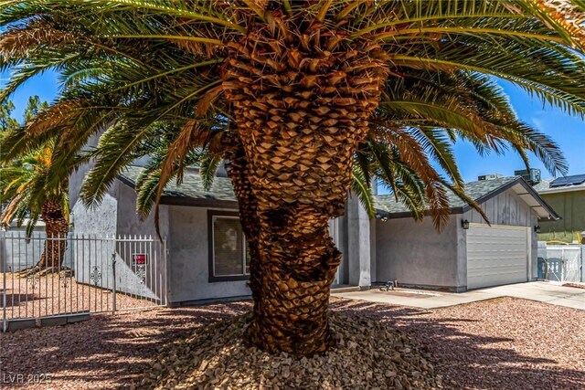 3158 Brockington Dr, Las Vegas, NV 89120 - view of front of property featuring a garage, driveway, and stucco siding