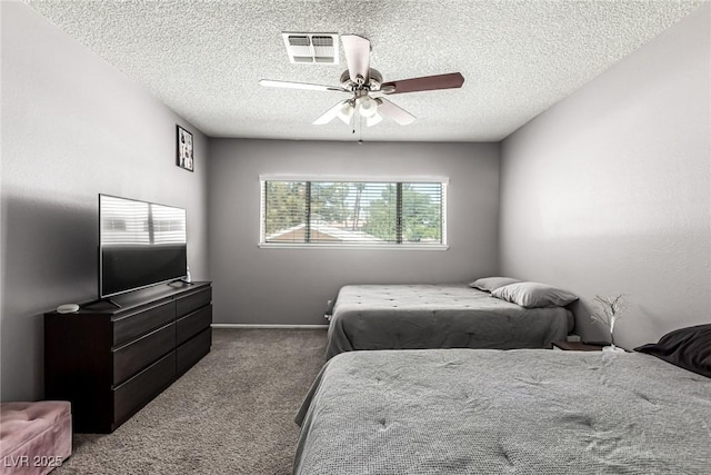 3158 Brockington Dr, Las Vegas, NV 89120 - carpeted bedroom with a textured ceiling and ceiling fan