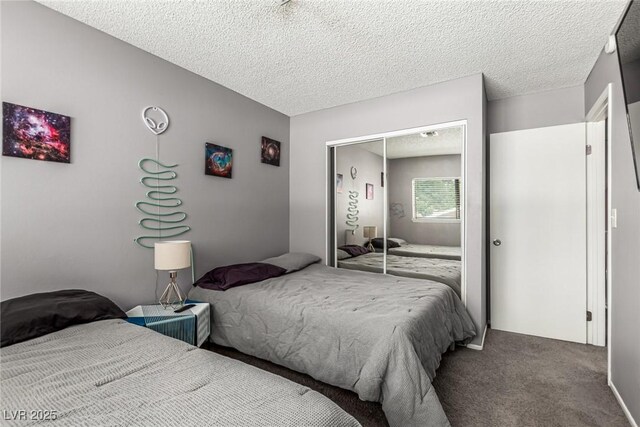 3158 Brockington Dr, Las Vegas, NV 89120 - carpeted bedroom featuring a closet and a textured ceiling