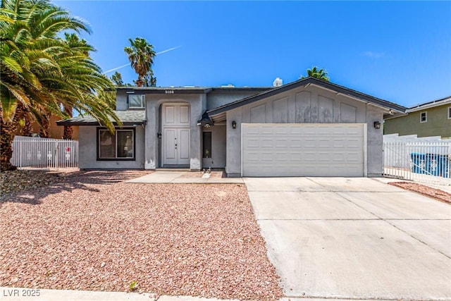 3158 Brockington Dr, Las Vegas, NV 89120 - view of front of property with an attached garage, driveway, and stucco siding