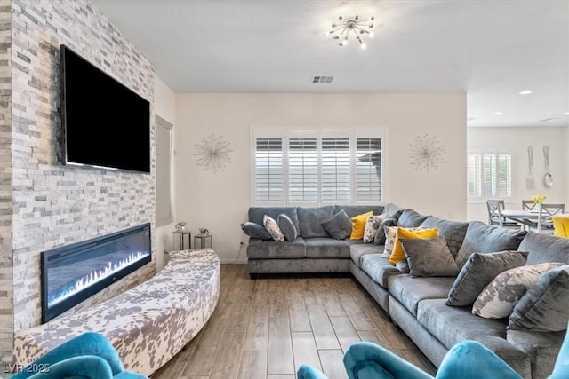 6421 Winecup St, Las Vegas, NV 89149 - living room with a fireplace and wood finished floors