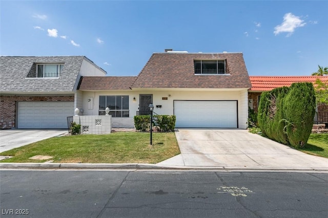 3785 Decade St, Las Vegas, NV 89121 - front of property featuring driveway, a front yard, roof with shingles, and brick siding