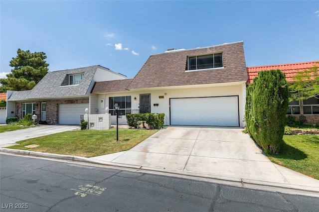 3785 Decade St, Las Vegas, NV 89121 - view of front property featuring roof with shingles, a front lawn, and mansard roof