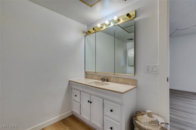3785 Decade St, Las Vegas, NV 89121 - bathroom with vanity and wood finished floors