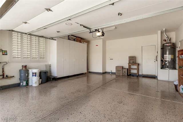 10463 Luna Magico Ave, Las Vegas, NV 89135 - garage featuring strapped water heater and a garage door opener