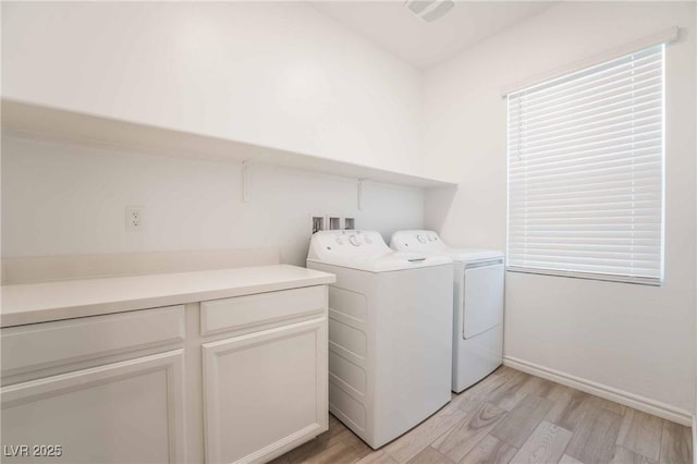 7124 Sayonara Vista St, North Las Vegas, NV 89084 - laundry area with light wood finished floors and independent washer and dryer