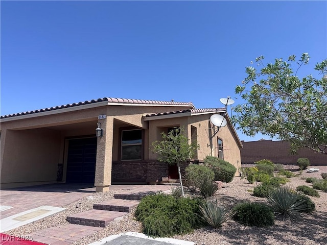 2653 Crystal Blue St, Laughlin, NV 89029 - view of front of property featuring stucco siding and a tile roof