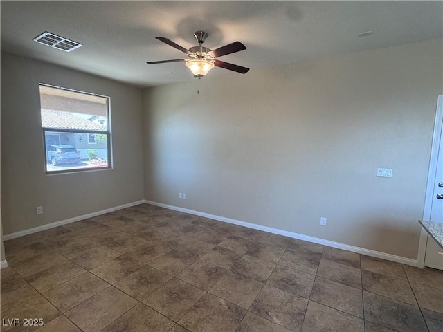 2653 Crystal Blue St, Laughlin, NV 89029 - spare room featuring a ceiling fan and baseboards