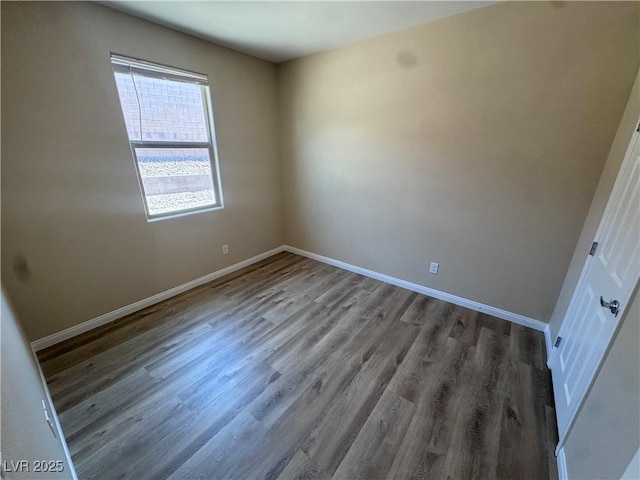 2653 Crystal Blue St, Laughlin, NV 89029 - empty room with baseboards and wood finished floors
