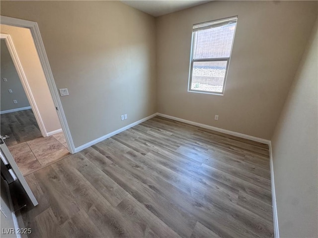 2653 Crystal Blue St, Laughlin, NV 89029 - empty room featuring baseboards and wood finished floors
