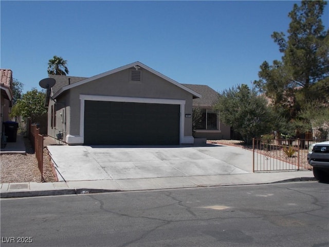 2211 Chipplegate Way N, Las Vegas, NV 89032 - ranch-style house featuring stucco siding, a garage, and driveway