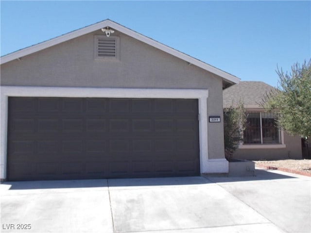 2211 Chipplegate Way N, Las Vegas, NV 89032 - single story home featuring stucco siding, driveway, and a garage