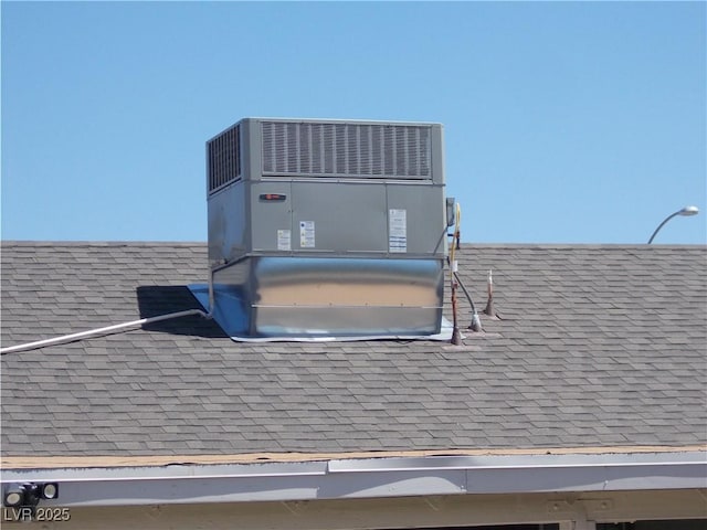 2211 Chipplegate Way N, Las Vegas, NV 89032 - exterior view of a shingled roof and a central AC unit